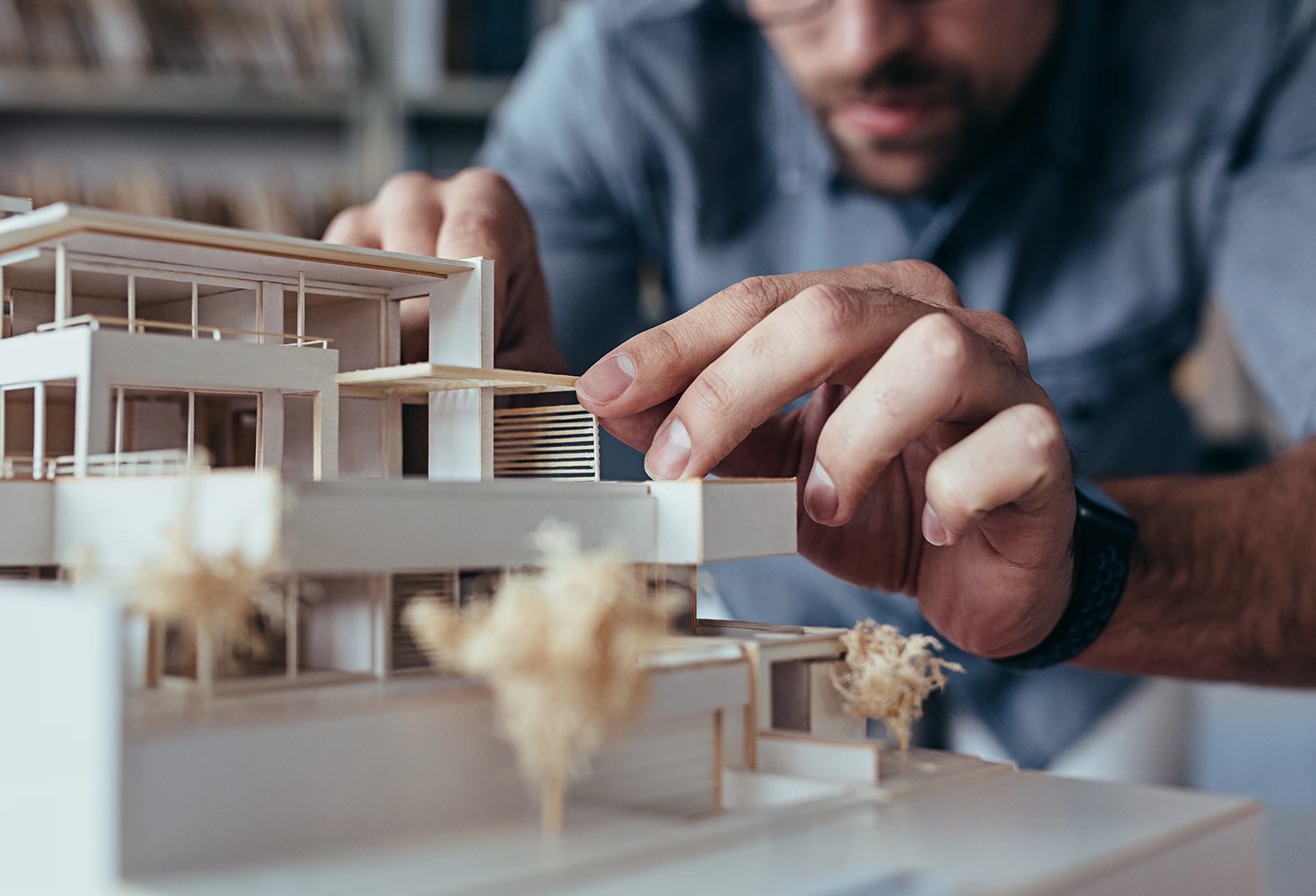 An architect building a small scale model 